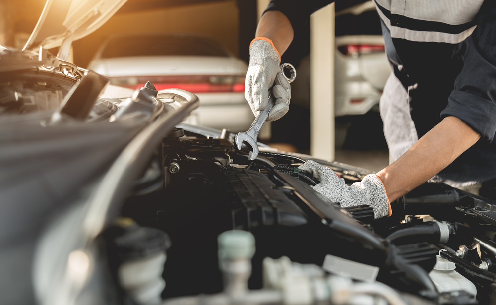 Automobile,Mechanic,Repairman,Hands,Repairing,A,Car,Engine,Automotive,Workshop